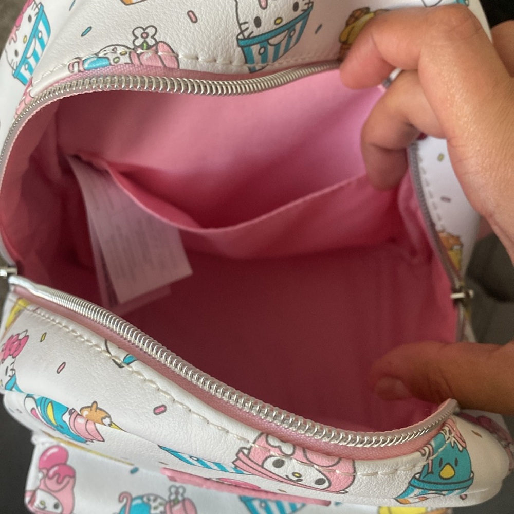 Loungefly Sanrio Cupcake Pattern Mini Backpack in White, Pink, Yellow, Blue - Picture 3 of 3
